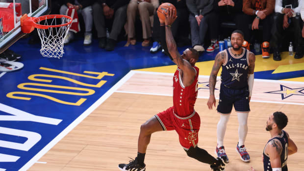 Western Conference forward LeBron James (23) of the Los Angeles Lakers dunks the ball against the Eastern Conference All-Stars during the first quarter in the 73rd NBA All Star game at Gainbridge Fieldhouse